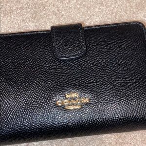 Coach wallet black / gold embellishment